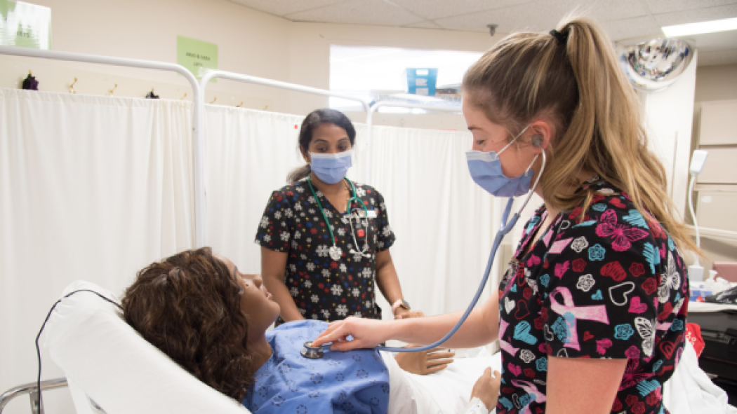 Two LHSC staff members participate in Project BETTY simulation training.