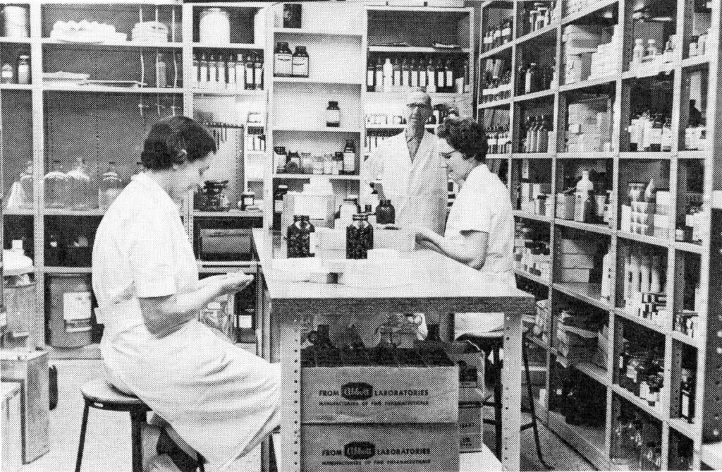 Members of the Pharmacy team in 1958 preparing ward stock.