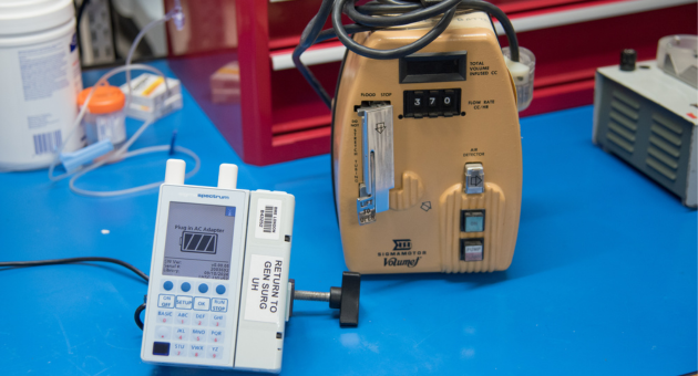 Infusion pumps are smaller today than in the past. The image shows an infusion pump from the mid-1980s above and one from 2025 below