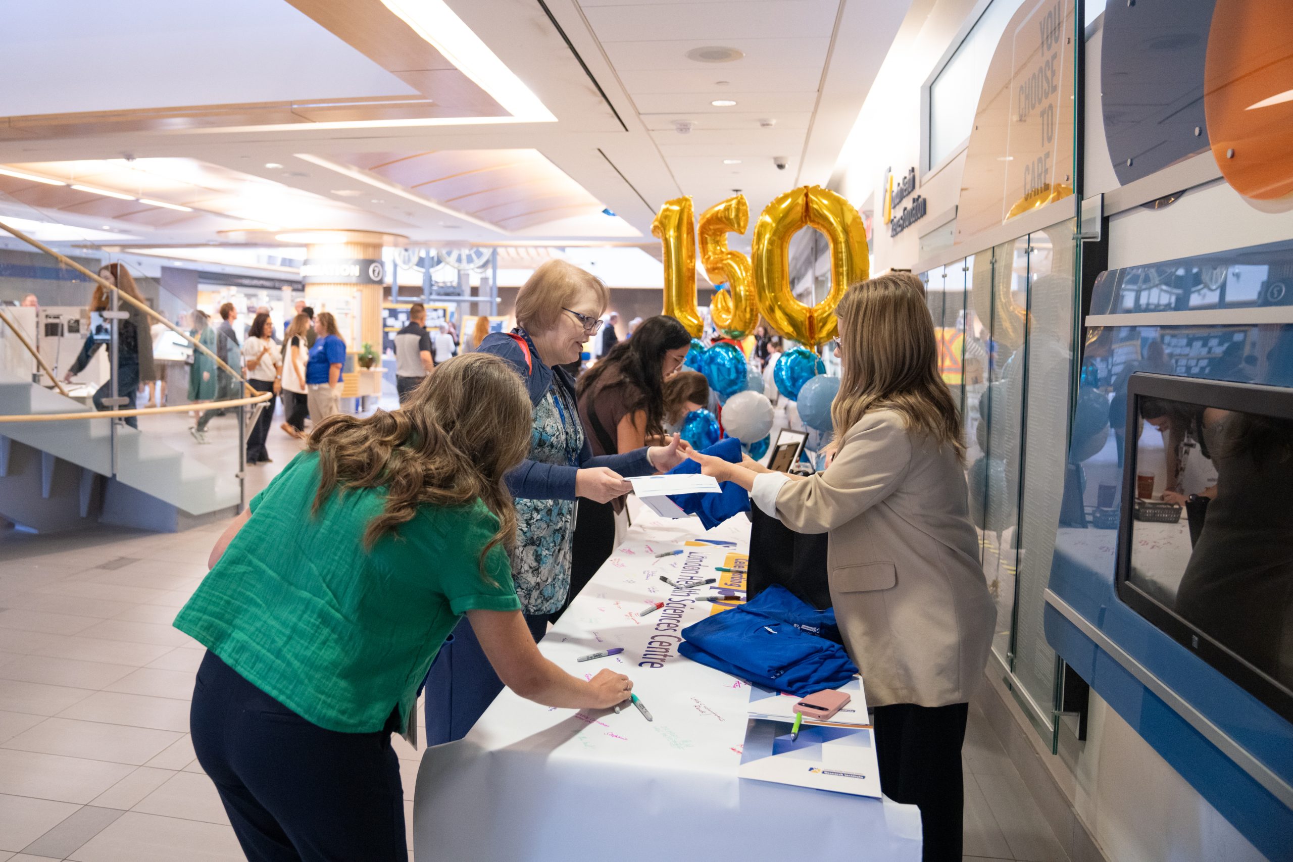 Volunteers welcoming guests as they arrived at Victoria Hospital and Children's Hospital for LHSC's 150th Anniversary Celebration.