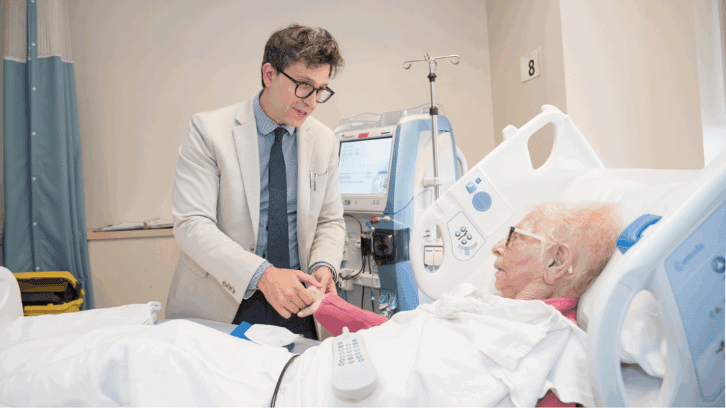Dr. Roshanov with dialysis patient