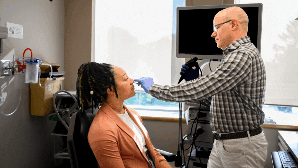 Dr. Rotenberg examining a patient