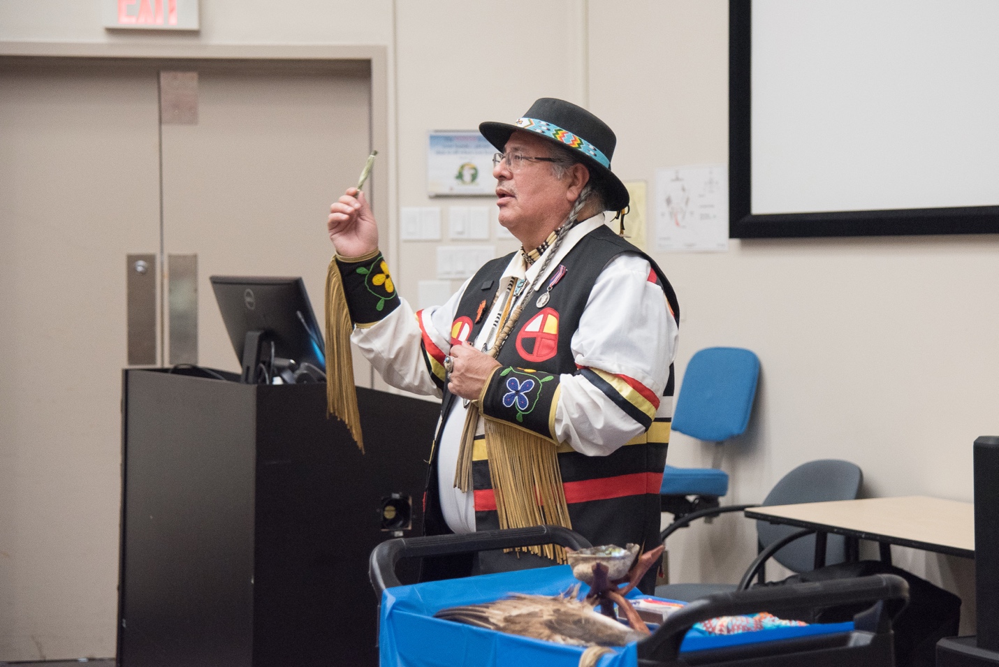 Elder Myeengun Henry, a member of LHSC's Visiting Elders Program, educates Team LHSC about smudging and Traditional Medicines.