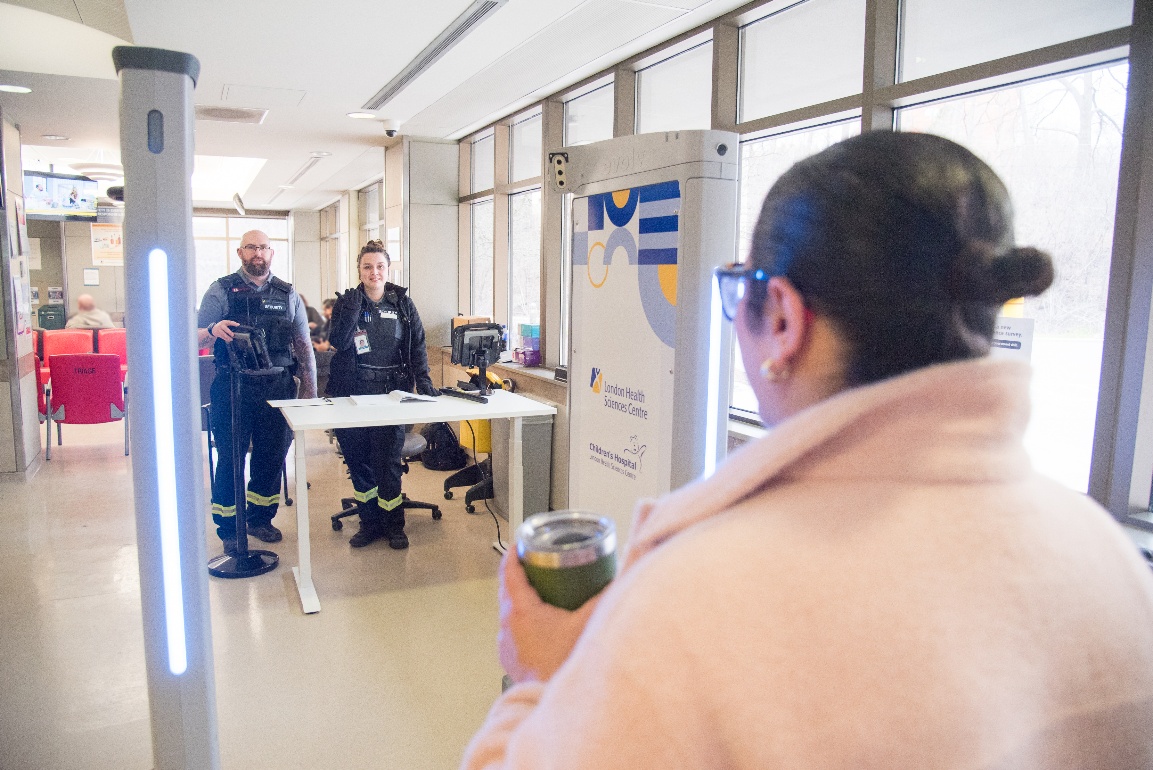 Members of LHSC's Security team providing a demonstration of the weapons detection system.