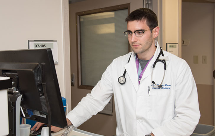 Doctor pictured in London health Science Centre using computer.