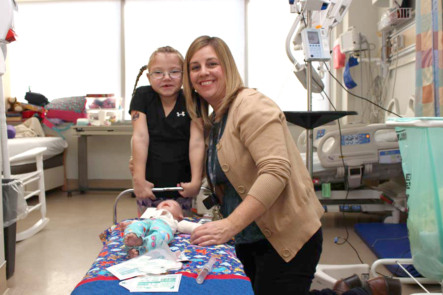 Alisha with Child Life Specialist, Ami.