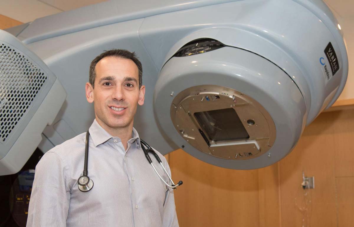 Dr. David Palma, researcher at Lawson and radiation oncologist at LHSC, looking at the camera.