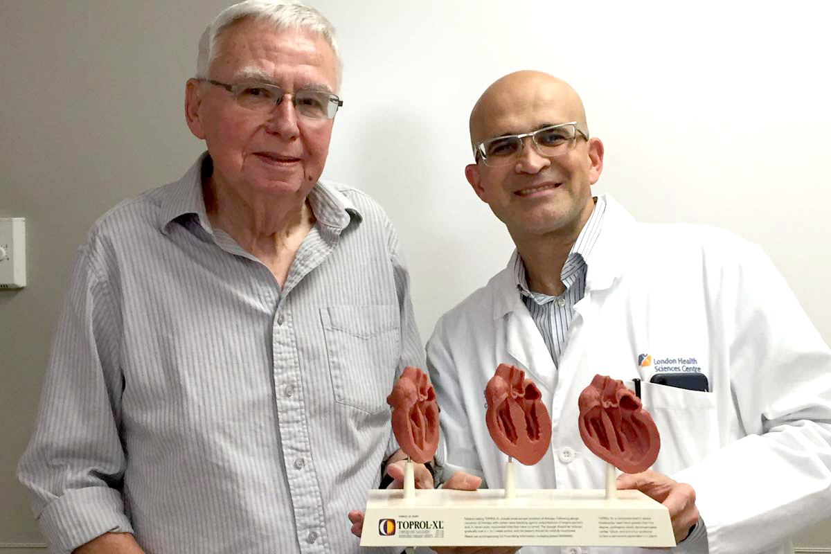 Patient James Fuller standing with Dr. Bob Kiaii, LHSC Chief of Cardiac Surgery.