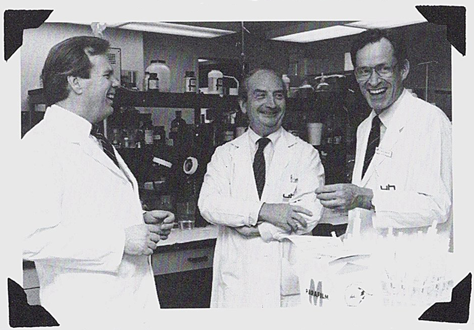 Image of Drs. Cal Stiller, John Dupre and Neil McKenzie share a laugh in a lab at University Hospital. 