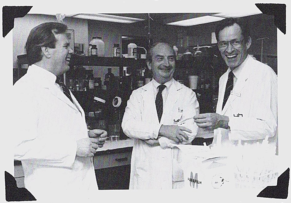 Image of Drs. Cal Stiller, John Dupre and Neil McKenzie share a laugh in a lab at University Hospital.