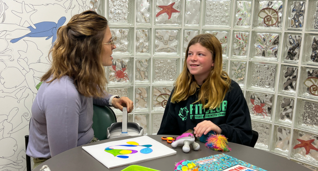 Child Life Specialist Bailey Felkar (left) with Patient Aubrey Keck (right)