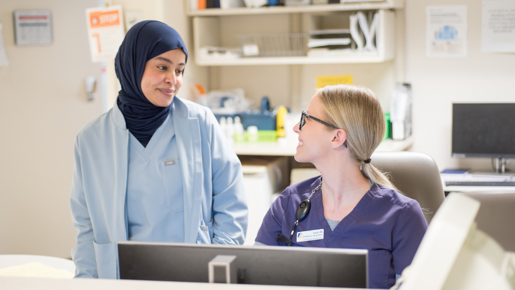 Pictured left to right: Nawal Ibrahim and Katrina (Katie) Koch at the nurses station