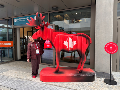 Dr. Jevremovic poses with Komak, Team Canada’s moose mascot.