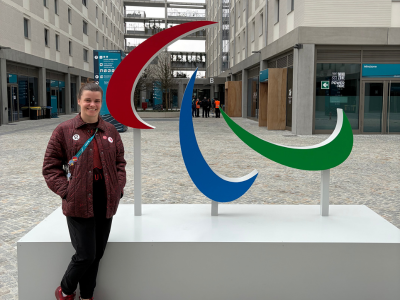 Dr. Kelton stands with the Agitos