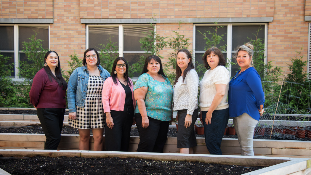 Indigenous members of Team LHSC stand in LHSC's Healing Garden at Victoria Hospital
