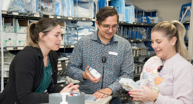 Pharmacist discusses medications with Emergency Room nurses