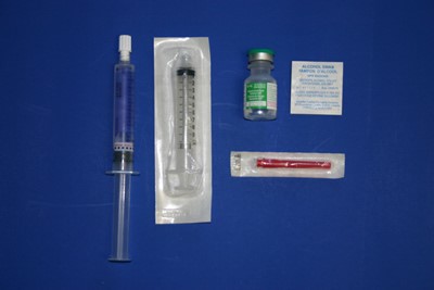 prepare one syringe of heparin-lock solution. Swab the bottle of heparin lock flush with an alcohol swab.