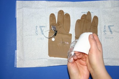 (1) pre loaded syringe containing 10 ml Saline XP sterile, (1) Sterile #22 Safe Step Huber Needle, (1) MicroClave® Clear and (2) 5x5 sterile gauze.