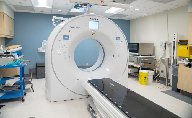 Computed Tomography (CT) scanner and patient table used as part of radiation therapy treatment planning.