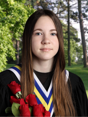 Paige Hillman in a graduation gown holding roses