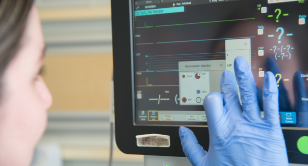 Pictured: Syndey St. Pierre programming a patient monitor