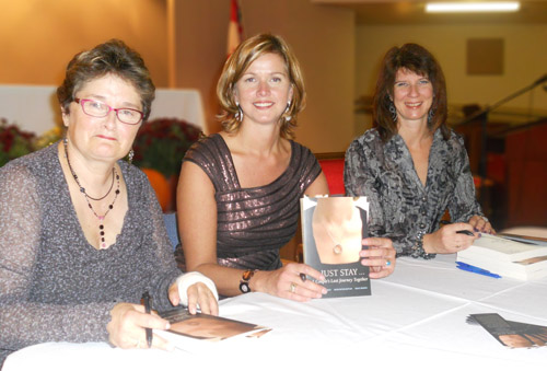 Signing book at official launch