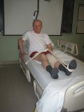 image of person demonstrating how to get out of and into bed after hip surgery