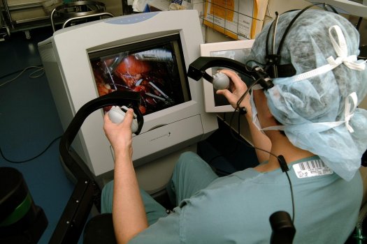 Dr. Patrick Luke, LHSC urologist and surgical director of renal transplantation, performs a urologic operation using the three-armed ZEUS™ robot