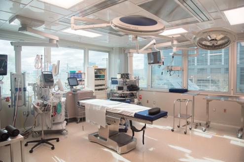 Surgery room filled with surgical equipment.