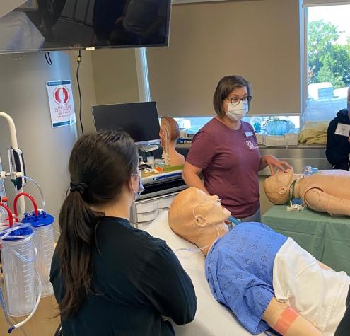 Sheila Hunt, UG Critical Care Clinical Educator, leads a station on Oxygen Therapy.