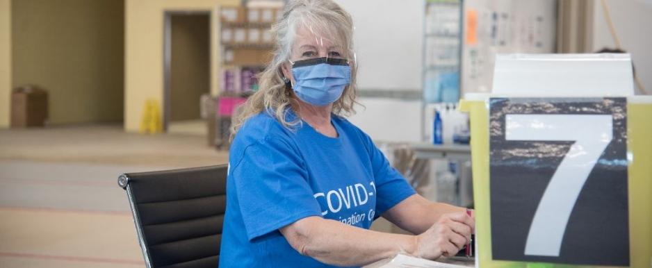 Vaccinators are LHSC nurses, nursing students, physicians, and nurse practitioners, and are wearing blue shirts.