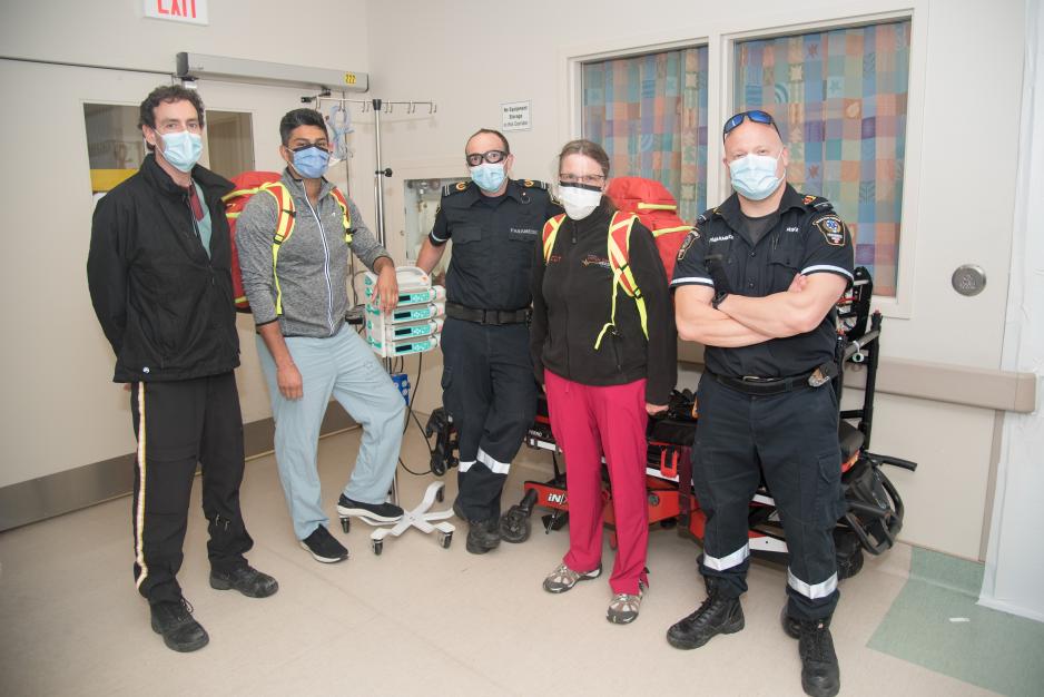 Members of the critical care transport team (from left): John Hewitt, Dr. Chintan Dave, Scott Marshall, Marilyn Risk, and Mike Chapman
