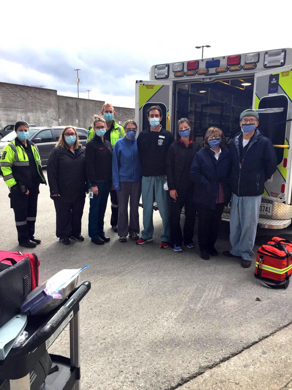 Members of the critical care transport team following a test run (from left): Kelli Matous, Michelle Stephens, Stacy Ballantyne, Adam Tapp, Marilyn Risk, John Hewitt, Brenda Morgan, and Dr. Raymond Kao