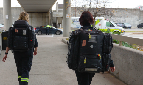 Image of transport team members walking to ambulance