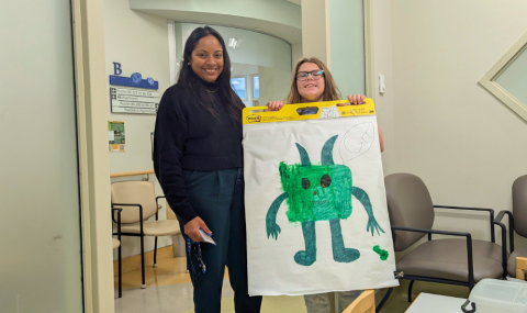 Dr. Abi Kandasamy with Charlotte Sangers and her pain monster
