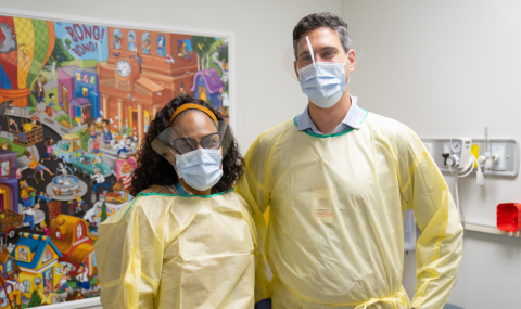 Dr. Michelle Barton-Forbes and Dr. Nadim Khalil in their personal protective equipment.