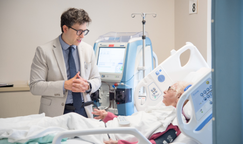 Above: Dr. Roshanov with patient, Norma Kameka, who is participating in a clinical trial. 