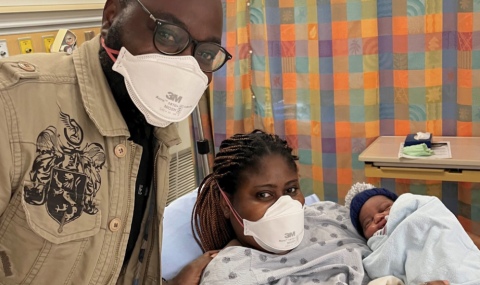 Parents with their newborn baby in the hospital
