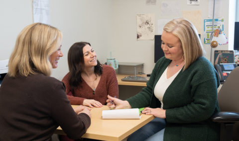 From left, Danielle Rai, Clinical Manager, Adult Inpatient Mental Health, meeting with Rechelle Jesso and Catherine Bowser, Transitional Case Management Outreach staff. 