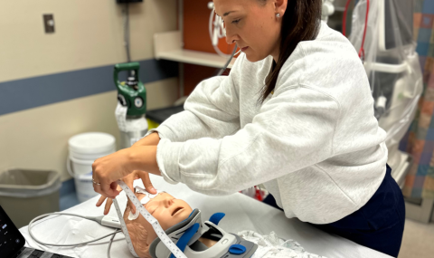 Susie Beres completes a simulation of a bedside assessment for the purposes of a study.