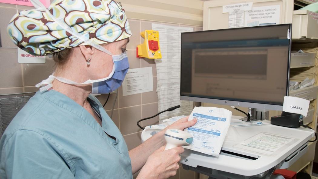 Katherine Richardson, OR nurse demonstrates the new scanning process now standard in the operating rooms at VH. Thumbnail