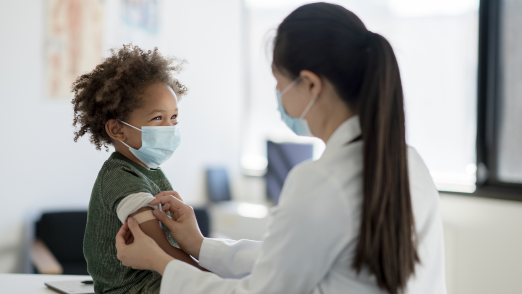 Image of child receiving a vaccine 