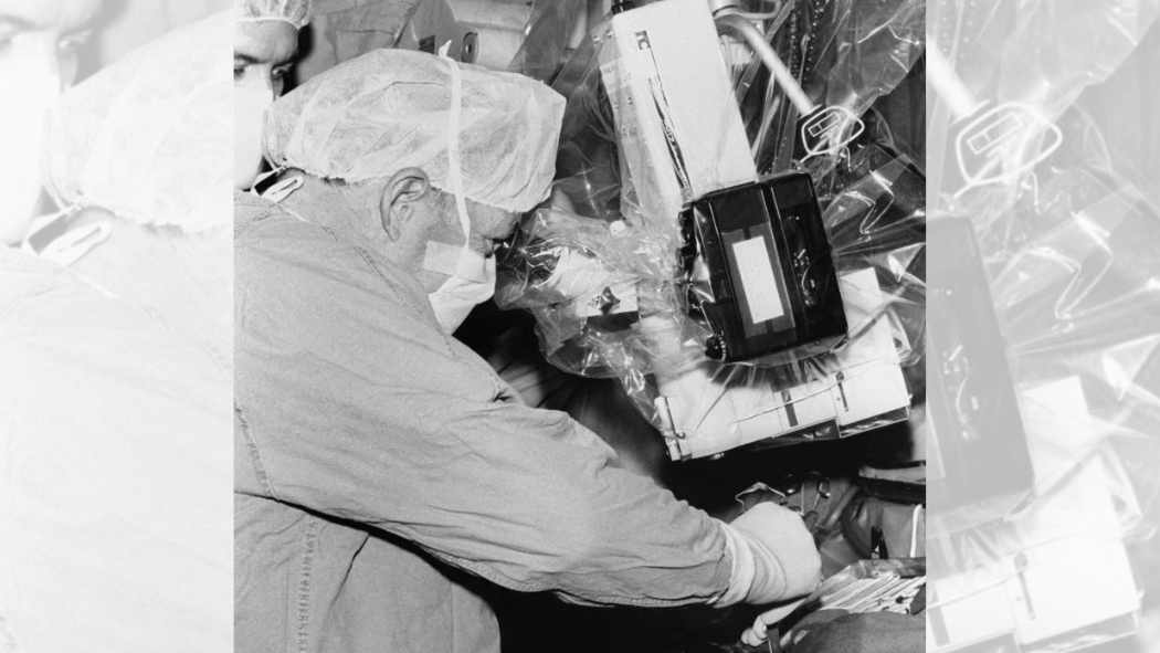 Dr. Charles Drake, performs surgery in 1982.