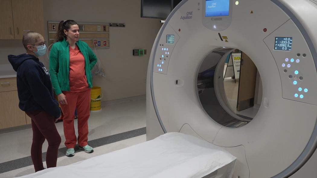 Andie Morrison touring an MRI suite 