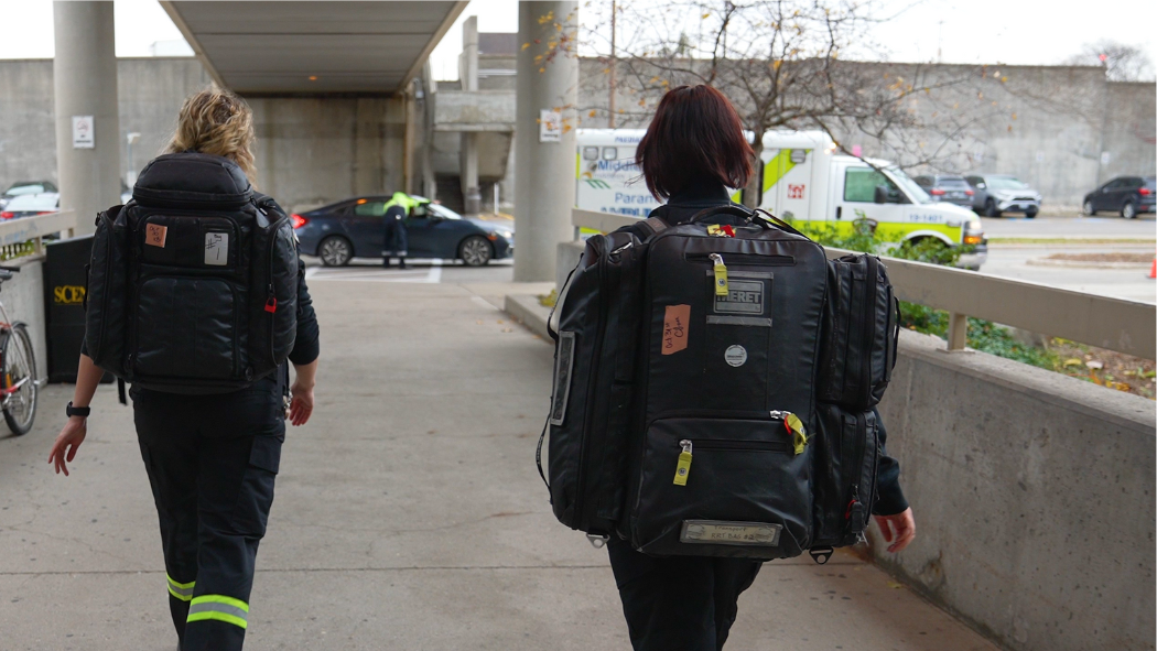 Image of transport team members walking to ambulance