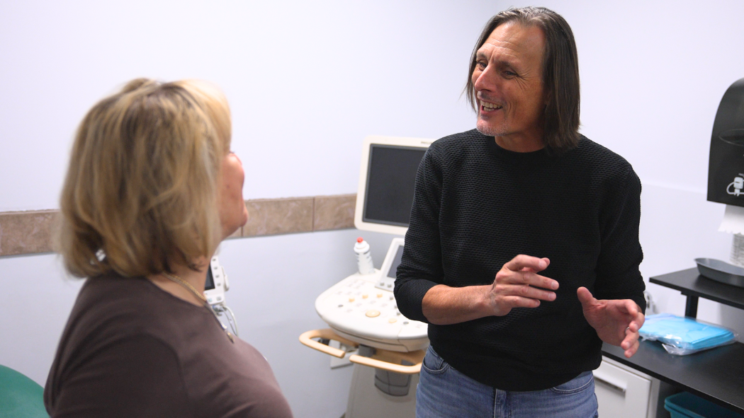 Dr. Laura Lyons and Greg Nash talking