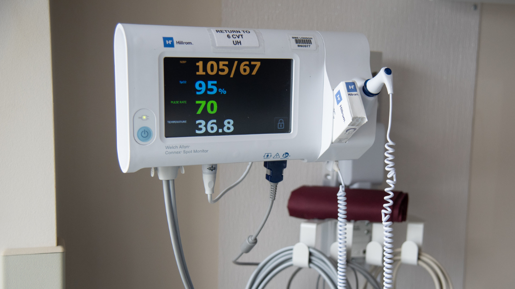 Vital Sign Machine attached to wall bed-side