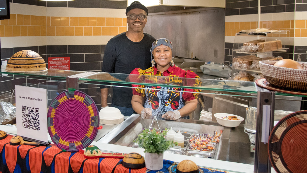 Maryem and Melvin Wright from Yaya’s Kitchen stand behind the serving counter at LHSC Victoria Hospital's Faye's Café.
