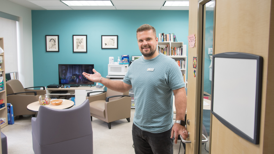 Irnes Zeljkovic, Clinical Navigator for PEPP at LHSC shows the PEPP meeting space for clients and their families and caregivers.