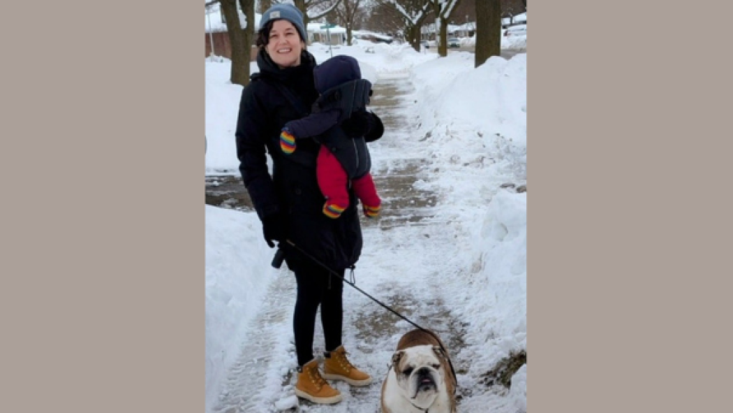 Jessie is pictured on an outdoor walk with her daughter and dog.